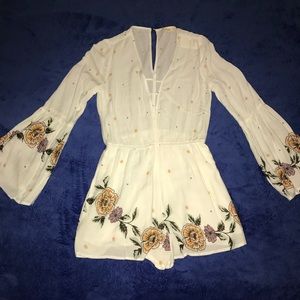 Brand new romper with tags